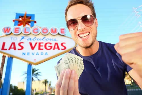 bigstock-Las-Vegas-man-winning-money-W-36640525